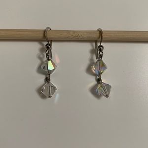 Drop earrings with crystal beads. Beads are transparent but reflect colors